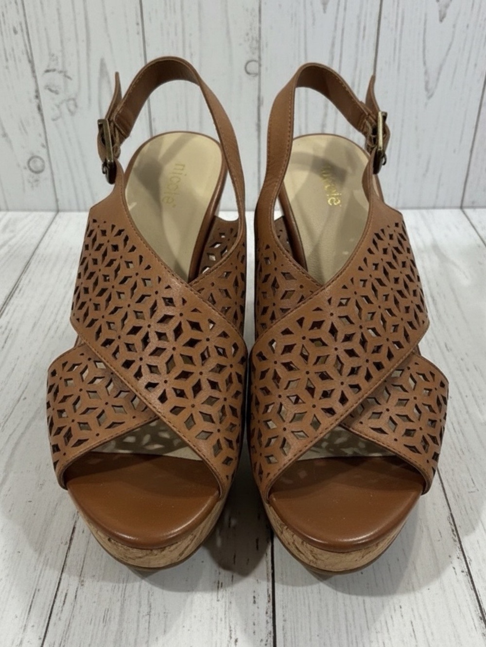 Cork and leather sandals by Nicole. 3 inch wedge heel. Size 8.
